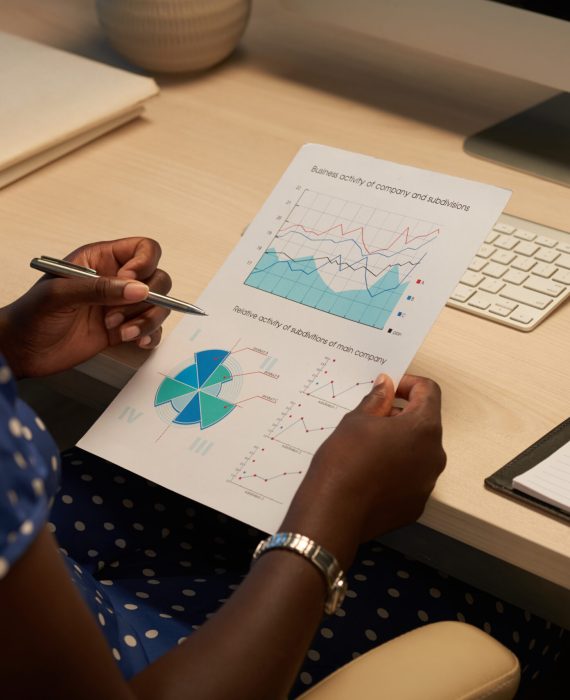 Analyzing business activity Female entrepreneur analyzing activity of her company